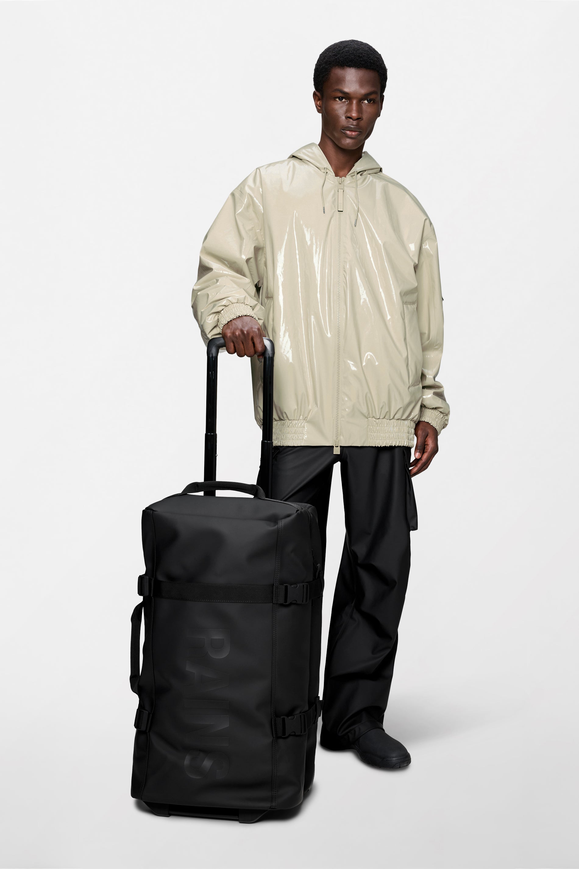 RAINS Texel Check-in Bag Black 62L H66 x D31 x W38 cm Suitcase